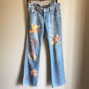 Flared bottom embroidered jeans